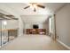 Bright bonus room featuring a ceiling fan and ample space for relaxation at 6610 Wesley Trail Holw, Cumming, GA 30028