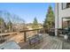 Wooden deck with seating area and a grill at 6610 Wesley Trail Holw, Cumming, GA 30028