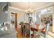 Formal dining room with hardwood floors, chandelier, and built-in hutch at 6610 Wesley Trail Holw, Cumming, GA 30028