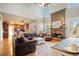 Two-story Gathering room featuring a stone fireplace and hardwood floors at 6610 Wesley Trail Holw, Cumming, GA 30028