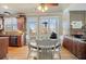 Kitchen with breakfast nook, stainless steel appliances, and hardwood floors at 6610 Wesley Trail Holw, Cumming, GA 30028