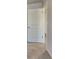 White interior door leading to a bedroom with carpeted floor at 2810 Torunn Ct, Atlanta, GA 30331