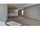 Large bonus room with carpeted floor and natural light at 2810 Torunn Ct, Atlanta, GA 30331