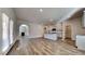 Open concept kitchen with island and hardwood floors at 2810 Torunn Ct, Atlanta, GA 30331
