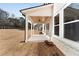 Covered patio with wood ceiling and modern lighting at 4265 Haynes Cir, Snellville, GA 30039