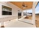 Covered back patio with ceiling fan and sliding glass doors at 4265 Haynes Cir, Snellville, GA 30039