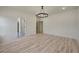 Spacious bedroom with light wood flooring and access to bathroom at 4265 Haynes Cir, Snellville, GA 30039