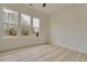 Bright bedroom with light flooring and large windows offering natural light at 4265 Haynes Cir, Snellville, GA 30039