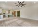 Open concept kitchen with light cabinetry, island, and stainless steel appliances at 4265 Haynes Cir, Snellville, GA 30039