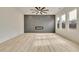Spacious living room with hardwood floors and a modern fireplace at 4265 Haynes Cir, Snellville, GA 30039