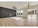 Bright living room features hardwood floors, fireplace, and sliding glass doors at 4265 Haynes Cir, Snellville, GA 30039
