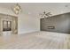 Open living area with hardwood floors and access to the front entry at 4265 Haynes Cir, Snellville, GA 30039