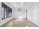 Formal dining room with hardwood floors, wainscoting, and chandelier at 210 Carl Sanders Dr, Acworth, GA 30101