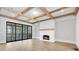 Bright living room featuring a fireplace and hardwood floors at 210 Carl Sanders Dr, Acworth, GA 30101