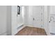 White mudroom with built-in bench and cabinets at 210 Carl Sanders Dr, Acworth, GA 30101