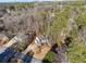 Aerial view of home surrounded by lush trees, highlighting its natural beauty and peaceful location at 3536 Evans Ridge Trl, Atlanta, GA 30340