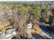 Aerial view of home nestled among mature trees, showcasing its privacy and serene setting at 3536 Evans Ridge Trl, Atlanta, GA 30340