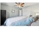 Bedroom showcasing natural light, ceiling fan, and comfortable sleeping space at 3536 Evans Ridge Trl, Atlanta, GA 30340