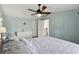 Well-lit bedroom boasts an updated ceiling fan and neutral paint at 3536 Evans Ridge Trl, Atlanta, GA 30340