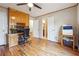 Bright office area offers built-in shelving, hardwood floors, and natural light at 3536 Evans Ridge Trl, Atlanta, GA 30340