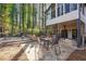 Stone patio with outdoor seating area, ideal for enjoying the peaceful backyard at 3536 Evans Ridge Trl, Atlanta, GA 30340