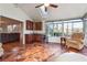 Bright sunroom features a beverage bar, wine cooler, skylight and beautiful views at 3536 Evans Ridge Trl, Atlanta, GA 30340
