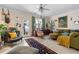 Living room with comfortable seating, fireplace, and access to a patio at 1680 Perserverence Hill Nw Cir # 23, Kennesaw, GA 30152