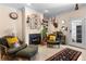 Living room with fireplace, comfortable seating and access to a patio at 1680 Perserverence Hill Nw Cir # 23, Kennesaw, GA 30152