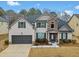 Two-story house with stone accents and a large yard at 4190 San Marco Way, Douglasville, GA 30135