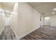 Long hallway with wood floors at 140 Wesley Place, Fayetteville, GA 30214