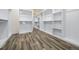 Large walk-in closet with ample shelving and hanging space at 140 Wesley Place, Fayetteville, GA 30214