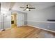 A bright bedroom with wood-look flooring, and a ceiling fan at 2824 Vinings Central Se Dr # 146, Atlanta, GA 30339