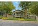 Charming exterior view of a home in a leafy, gated community at 2824 Vinings Central Se Dr # 146, Atlanta, GA 30339