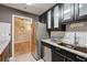 Modern kitchen featuring stainless steel appliances, granite countertops, and subway tile backsplash at 2824 Vinings Central Se Dr # 146, Atlanta, GA 30339