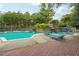 Community pool with cascading waterfalls and plenty of lounge seating at 2824 Vinings Central Se Dr # 146, Atlanta, GA 30339