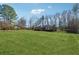 Ranch home with a large backyard and wooded area at 3005 Brookfield Cir, Cumming, GA 30040