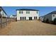 Spacious backyard with solar panels and wooden fence at 309 Bowfin Trl, Mcdonough, GA 30253