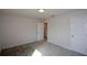Spacious bedroom with neutral wall colors and carpet flooring at 309 Bowfin Trl, Mcdonough, GA 30253