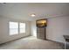 Spacious bedroom with large windows, plush carpeting, and a TV at 309 Bowfin Trl, Mcdonough, GA 30253