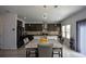 Modern kitchen with stainless steel appliances and granite countertops at 309 Bowfin Trl, Mcdonough, GA 30253