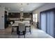 Modern kitchen with stainless steel appliances and granite countertops at 309 Bowfin Trl, Mcdonough, GA 30253