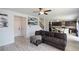 Open living room with kitchen view and hardwood floors at 309 Bowfin Trl, Mcdonough, GA 30253