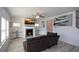Spacious living room with fireplace and hardwood floors at 309 Bowfin Trl, Mcdonough, GA 30253