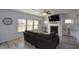 Spacious living room with fireplace and large TV at 309 Bowfin Trl, Mcdonough, GA 30253