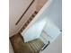 Upstairs hallway with carpet and access to bedrooms at 309 Bowfin Trl, Mcdonough, GA 30253