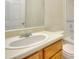 Traditional bathroom featuring a vanity, mirror, and toilet for everyday convenience at 2878 Norfair Loop, Lithonia, GA 30038