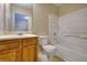 This bathroom has a shower and tub combo with a toilet and sink at 2878 Norfair Loop, Lithonia, GA 30038
