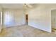Bedroom featuring neutral walls, carpet flooring, and several doors at 2878 Norfair Loop, Lithonia, GA 30038