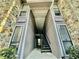 Apartment building entrance with access to multiple floors at 4079 Woodridge Way, Tucker, GA 30084