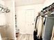 Walk-in closet with wire shelving and hanging storage for organized wardrobe at 4079 Woodridge Way, Tucker, GA 30084